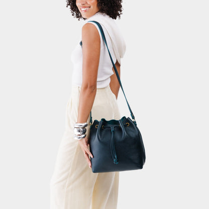 Boreal*Large | Model wearing slouchy crossbody bag with drawstring closure
