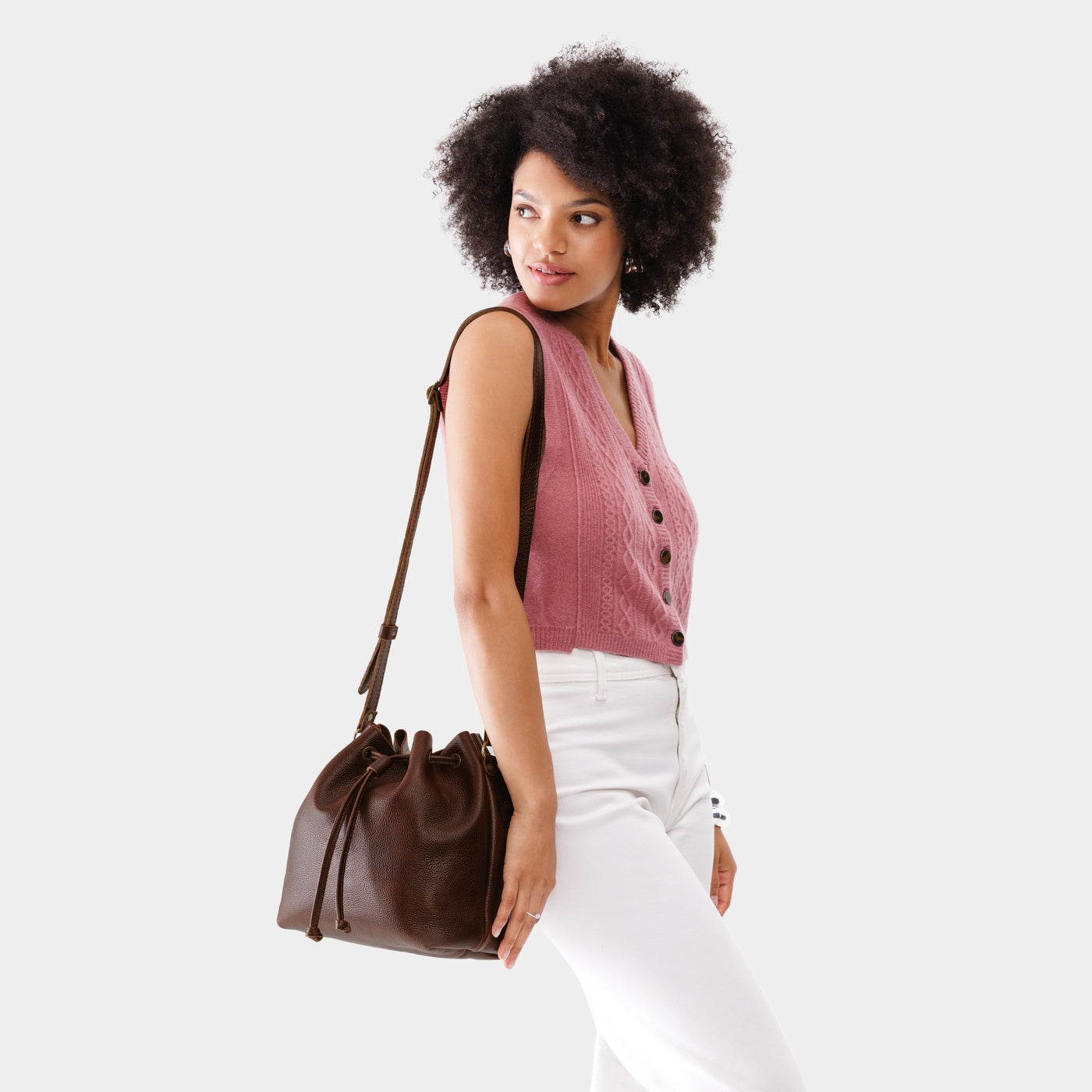 Coldbrew*Large | Model wearing slouchy crossbody bag with drawstring closure