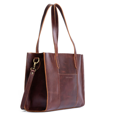 Timber*East/West | Structured wide tote bag with overlapping panels and crossbody strap