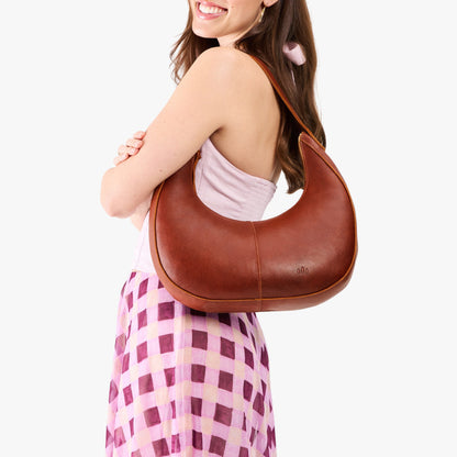 Nutmeg*Large | Crescent shaped shoulder bag with zipper closure and adjustable strap