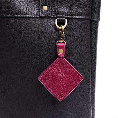 Orchid | Diamond shaped leather AirTag holder on a lobster clasp keychain