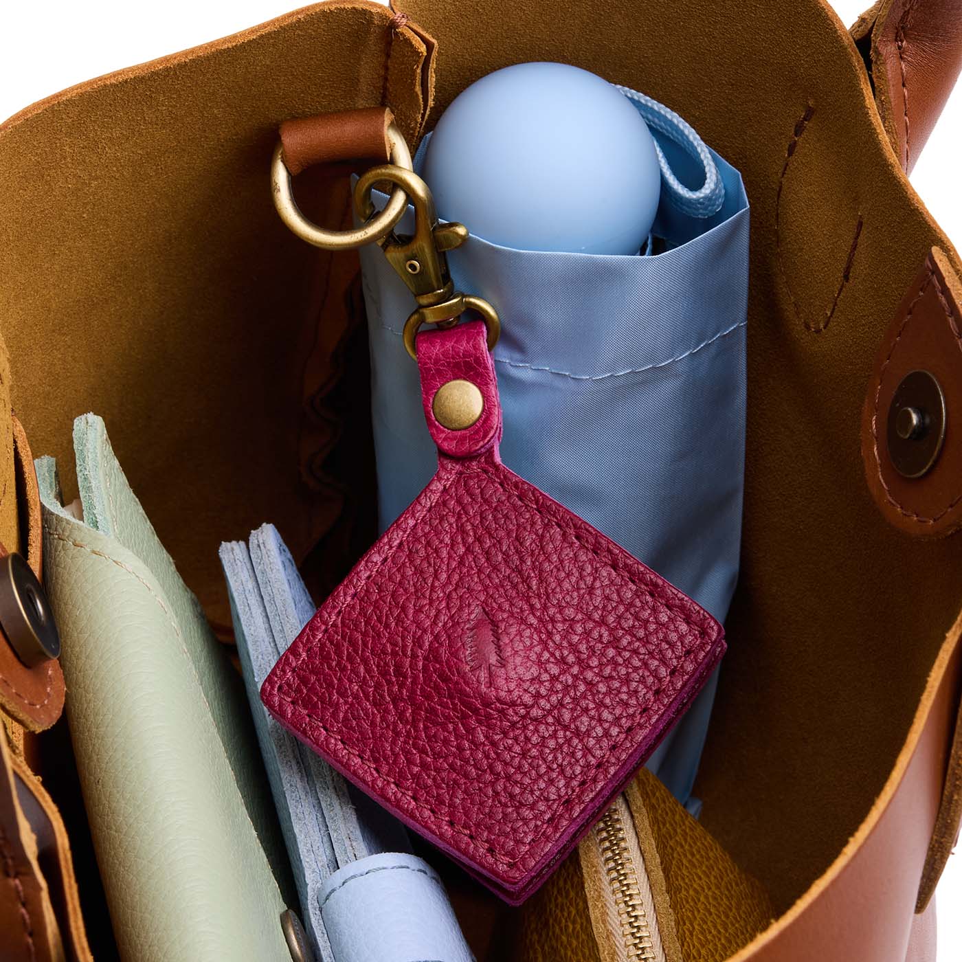 Orchid | Diamond shaped leather AirTag holder on a lobster clasp keychain