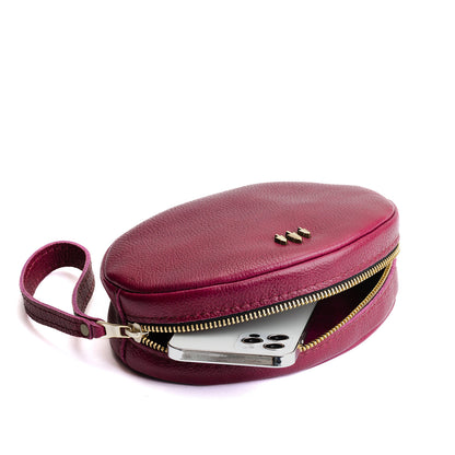 Orchid*Large | Oval shaped pouches with zipper and wristlet strap open with a smartphone inside