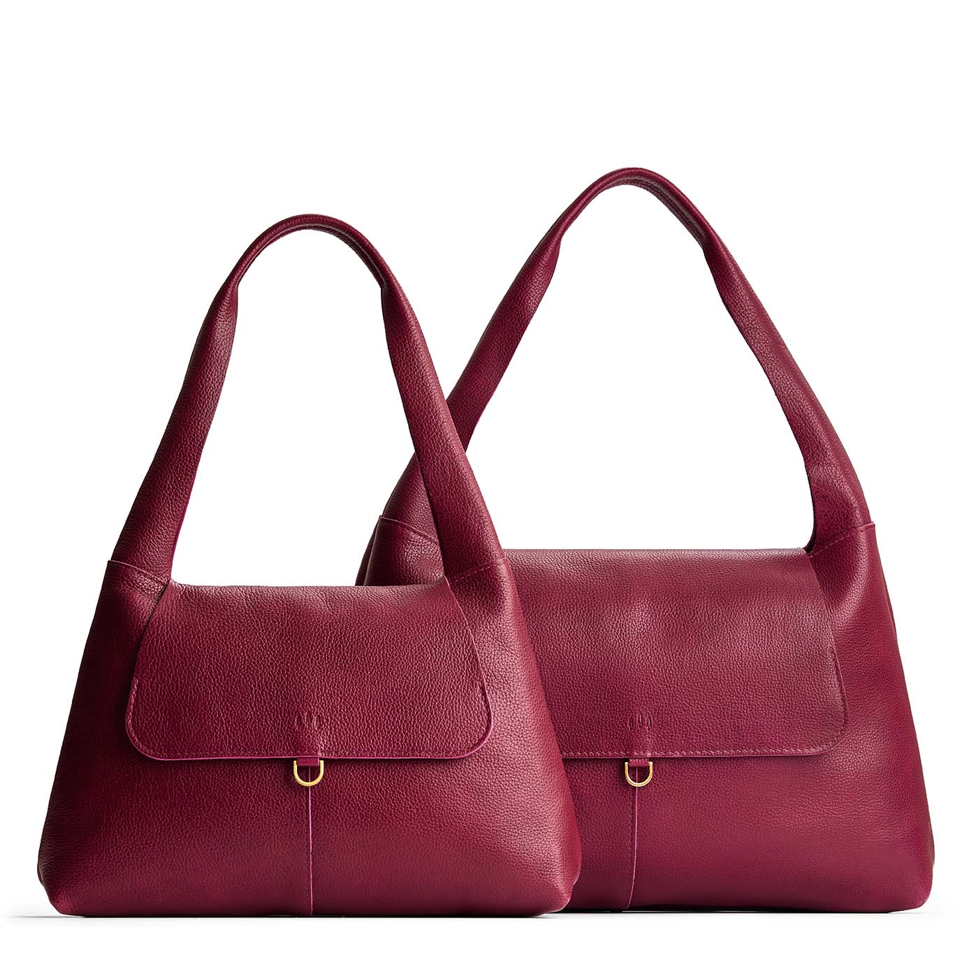 Orchid | Comparison image of a slouchy triangle shaped shoulder bag with a flap